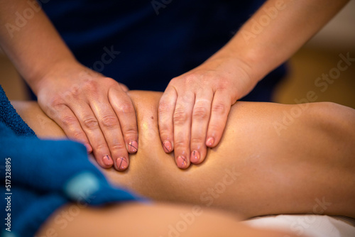 A girl receives a therapeutic and relaxing massage