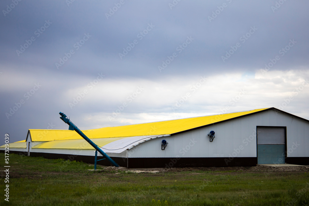 Obraz premium Farm for cows. View from the front of the building.