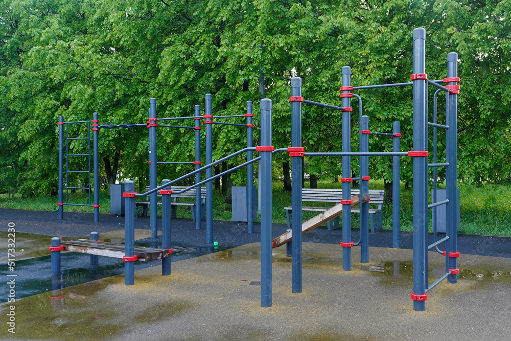 Playground for workout in a public park after a rain Playground for workout in a public park after a rain