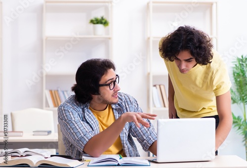 Two male students in the classroom