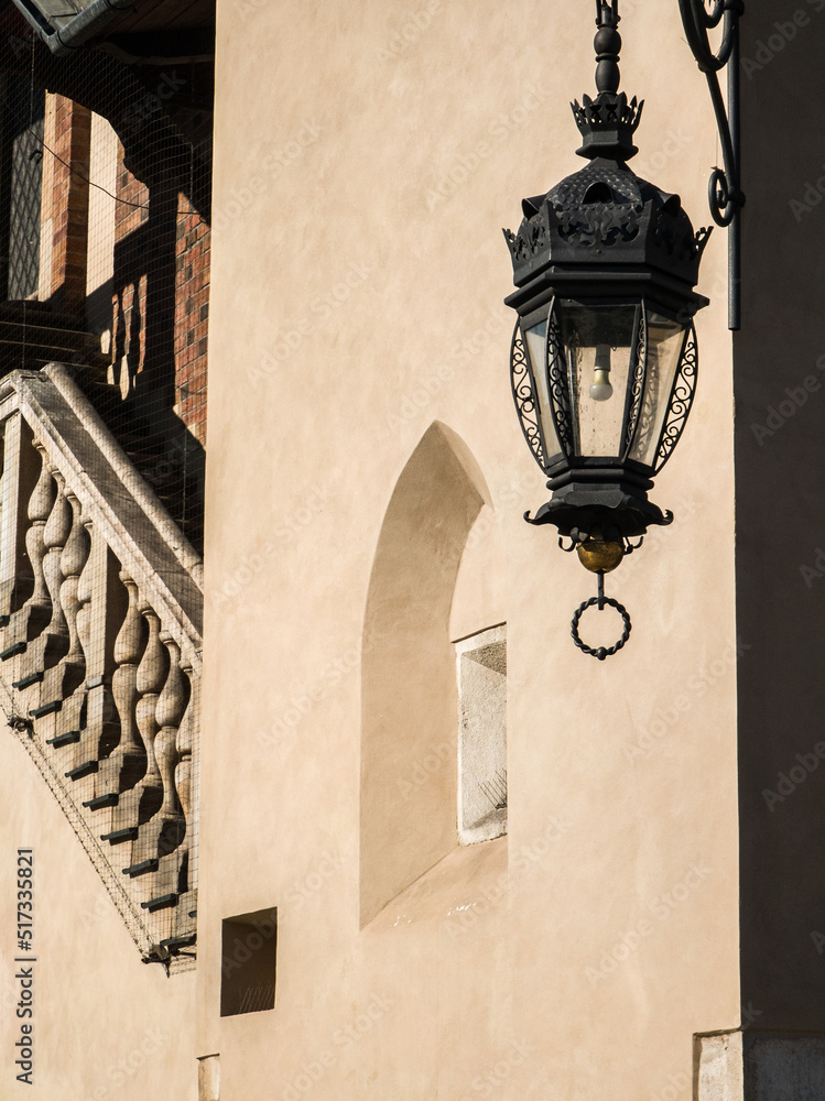 Modern european architecture in Krakow. Close-up of old lantern
