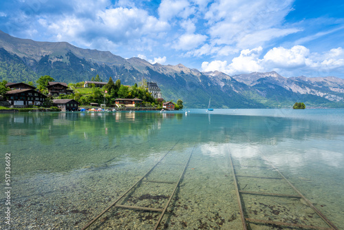 Obraz na płótnie crystal clear water of Brienz lake in Iseltwald in Switzerland w salonie