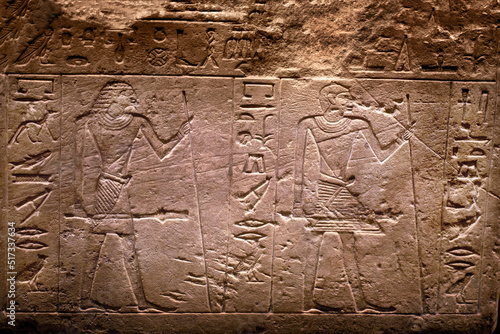 Hieroglyphic carving on an ancient Egyptian sargophagus in an ancient temple, selective focus