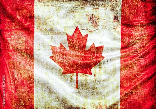 Canadian country flag painted on old paper