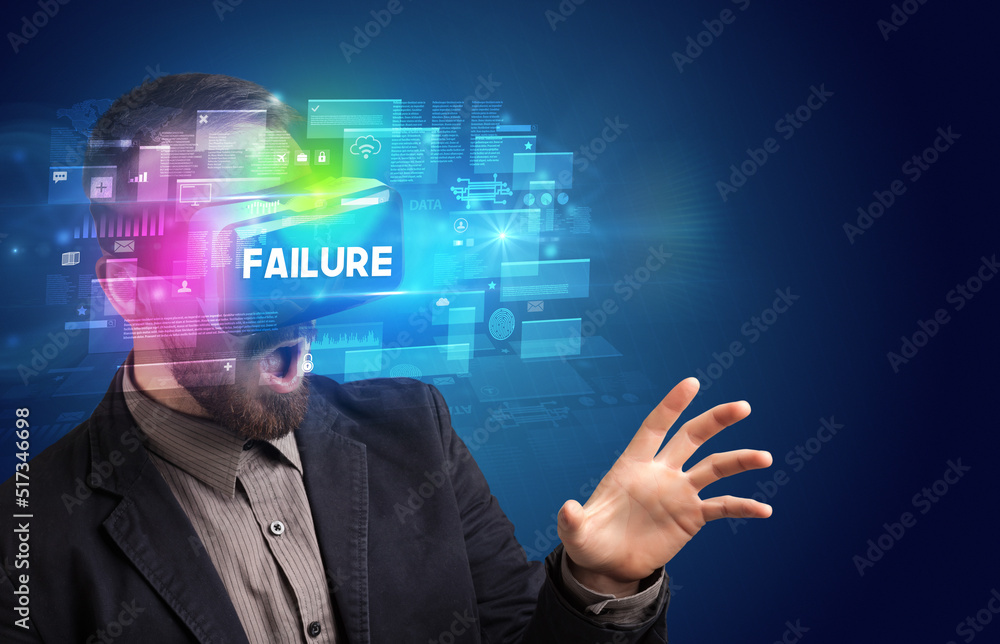 Businessman looking through Virtual Reality glasses Businessman looking through Virtual Reality glasses