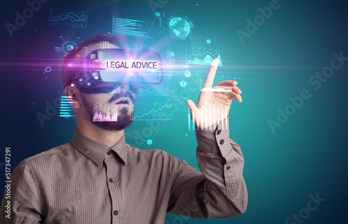 Businessman looking through Virtual Reality glasses