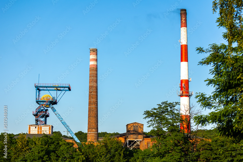 Distant view for the shaft tower of a closed black coal mine. Decarbonization processes in the modern world during the energy crisis