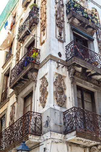 Facade of an old apartment building in El Raval, Barcelona, Catalonia, Spain, Europe