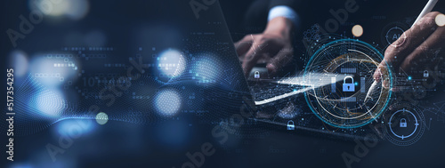 Cyber security and data protection. Businessman using digital tablet protecting business and financial data with virtual network connection, smart solution from cyber attack, innovation technology