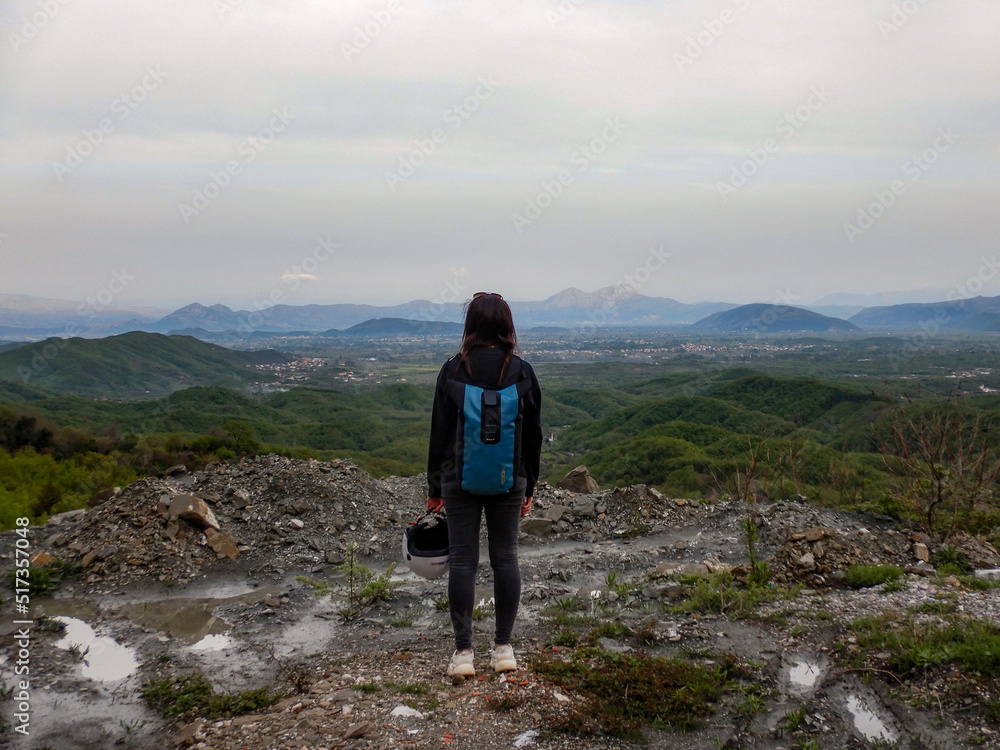 Standing girl with hilly mountain Montenegro panorama