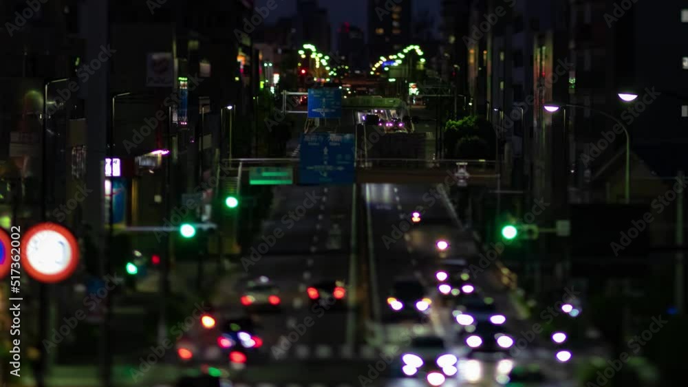A dusk timelapse of the miniature traffic jam at the street in Setagaya Tokyo zoom A dusk timelapse of the miniature traffic jam at the street in Setagaya Tokyo zoom