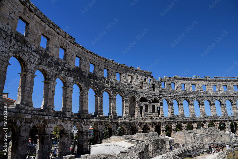 Obraz premium Pula, Croatia - 07 07 2022: Photography of ancient walls and architectural detail of arena in Pula from Roman period.