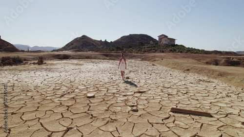 Female tourist visit old abandoned mines of Mazarron in Murcia on blue sky background during sunny summer day. Travel destinations. Europe. Spain photo