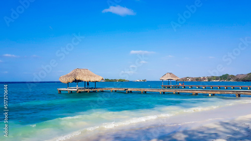 Relaxing sun protection hut. Paradise scenery in Isla Rosario, Colombia. Tropical landscape. Beautiful seascape. Lagoon beach. Exotic background copy space. Tourism destination banner, summer vacation