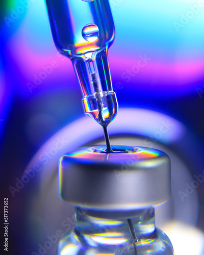 Vaccine needle​ syringe​ hypodermic​ injection single dose for prevention​ immune treatment​ illness​ virus​ covid 19 ​ child​ and adult.concept antibiotic​ drug insullin.selective focus