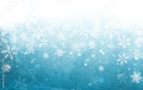 Christmas background with snowflakes and snow on blue grunge background