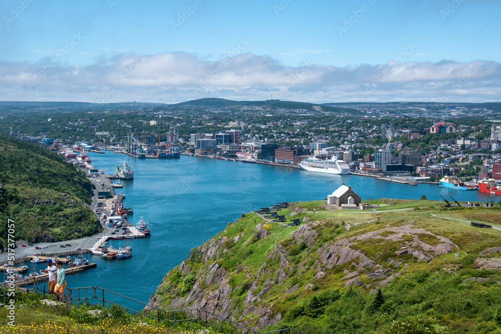 A view of St. John's harbour in Newfoundland, taken from atop Signal Hill, with the Queen's Battery in the foreground.