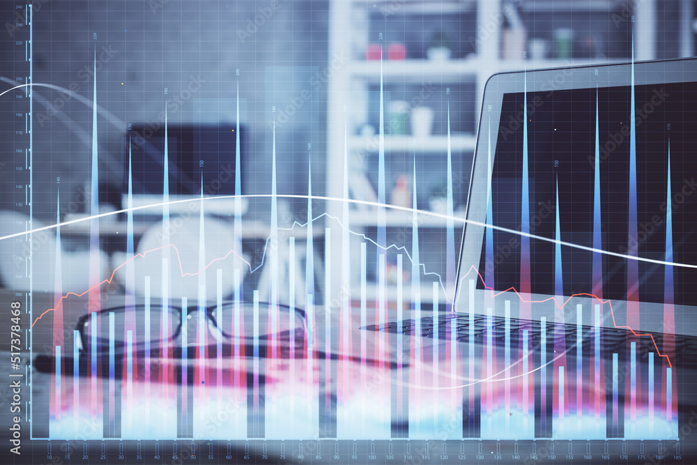 Forex market chart hologram and personal computer background. Multi exposure. Concept of investment. Forex market chart hologram and personal computer background. Multi exposure. Concept of investment.