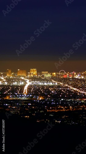 Las Vegas Nevada dusk to night vertical cityscape mountaintop time lapse video.