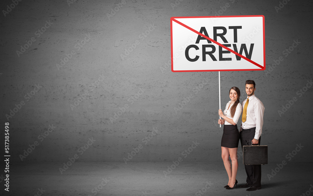 business person holding a traffic sign business person holding a traffic sign