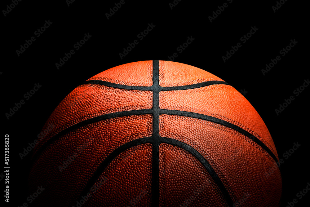 Basketball on black background.