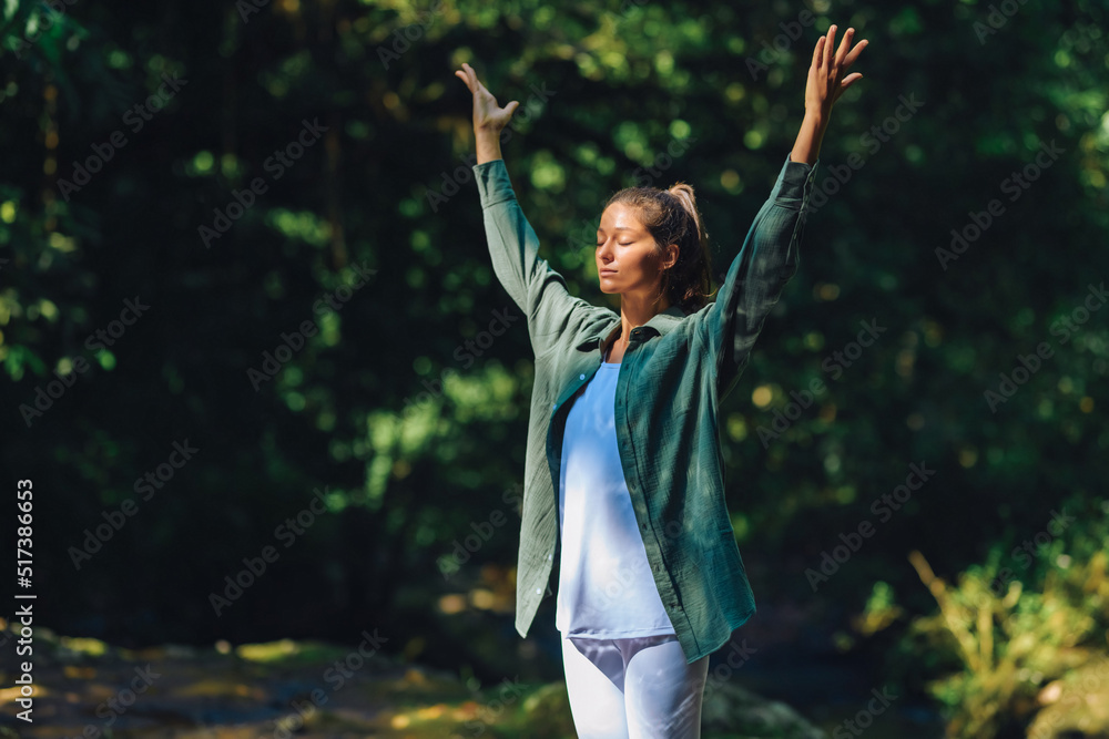 European girl doing yoga and walking in nature. European girl doing yoga and walking in nature.