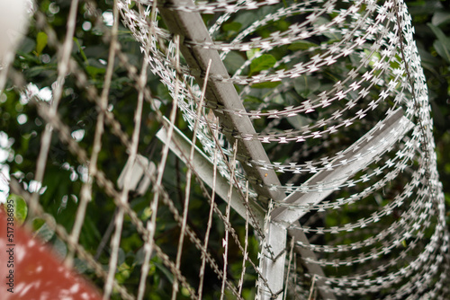 Barbed wire, also known as barb wire