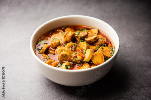 Stir fried taro roots. Arbi ki sabji, ghuiya masala curry Sabzi or arvi dum Masala. Garnished with coriander © StockImageFactory