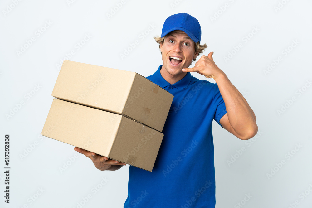 Delivery man over isolated white background making phone gesture. Call me back sign Delivery man over isolated white background making phone gesture. Call me back sign