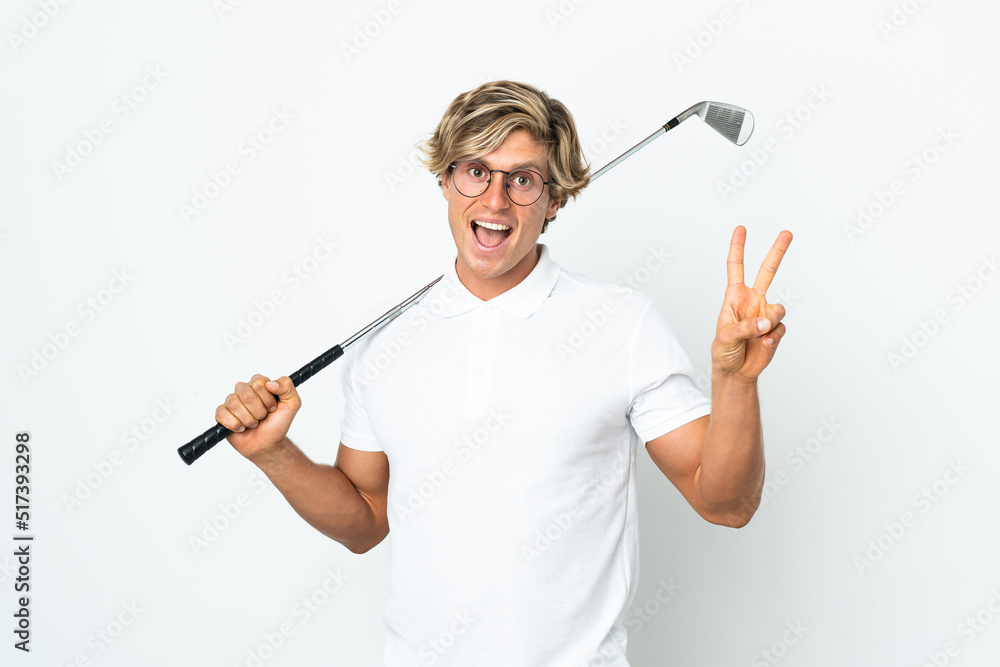 English man playing golf smiling and showing victory sign English man playing golf smiling and showing victory sign