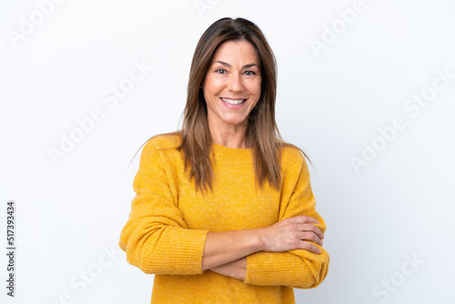 Middle age caucasian woman isolated on white background keeping the arms crossed in frontal position photo