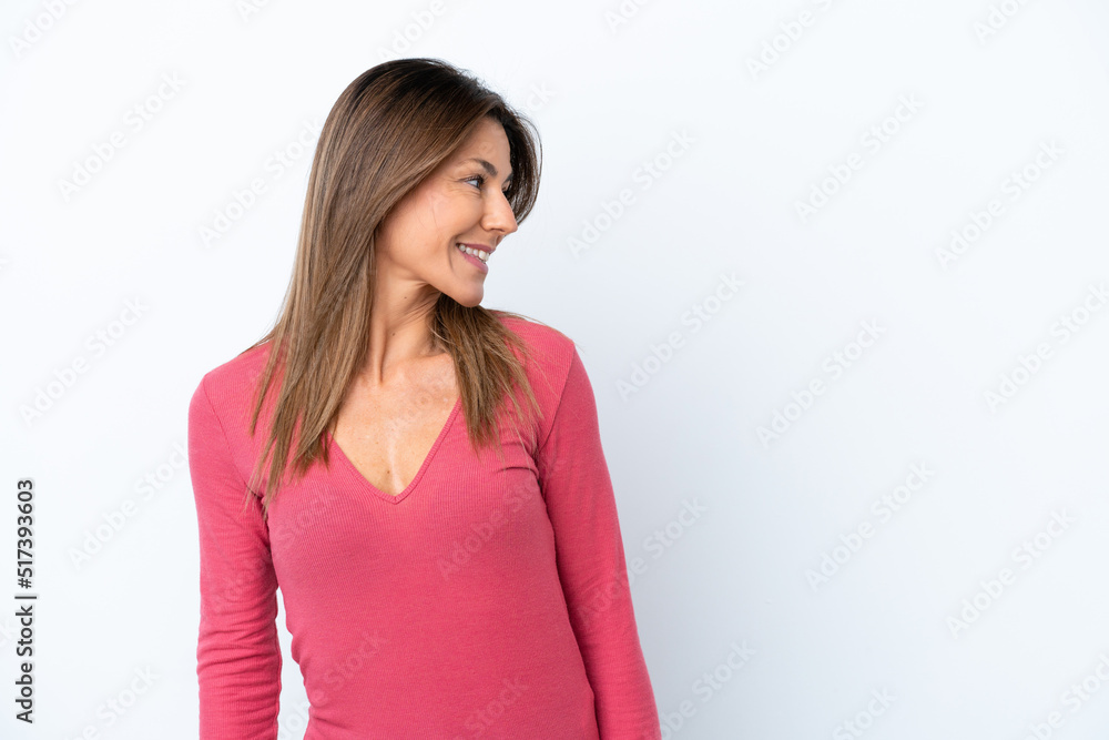 Middle age caucasian woman isolated on white background looking side Middle age caucasian woman isolated on white background looking side
