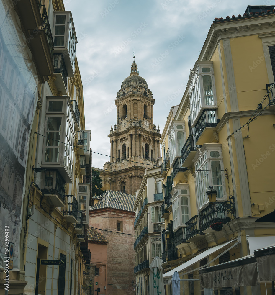 The cathedral of Malaga seen from one of its beautiful alleys.