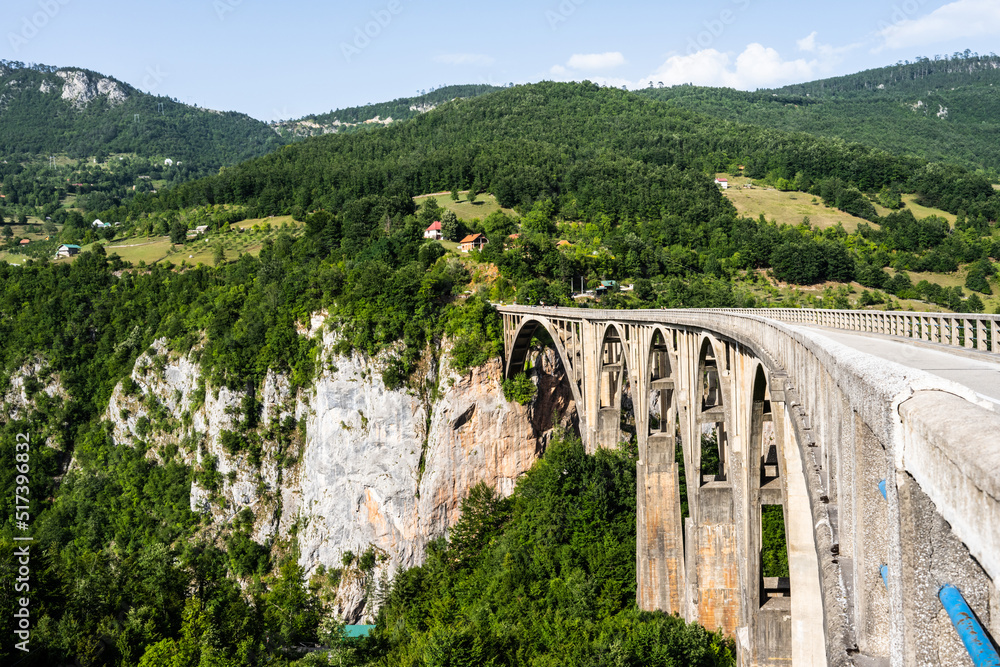 Durdevica Tara bridge in Montenegro and beautiful mountain hills in Durmitor national park. Amazing nature view from top
