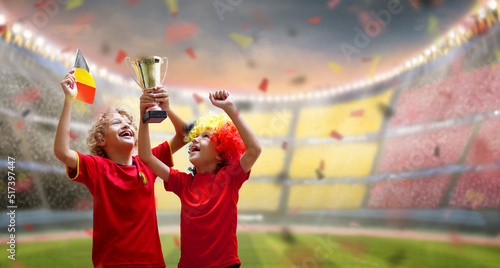 Belgium football fan. Belgian kids play soccer.