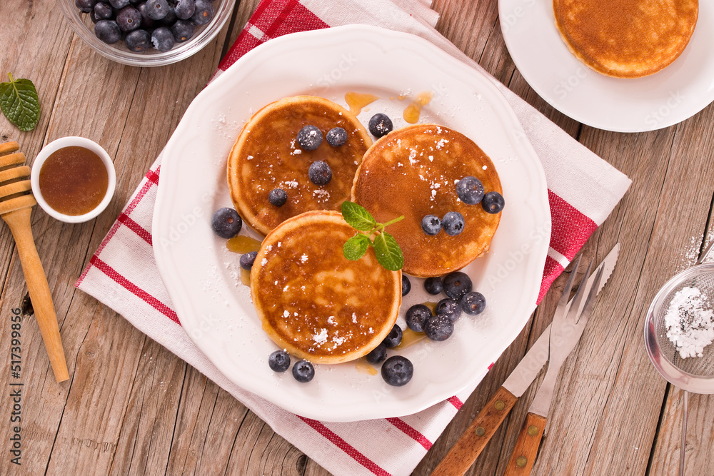 Pancakes with blueberries and chocolate cream. Pancakes with blueberries and chocolate cream.