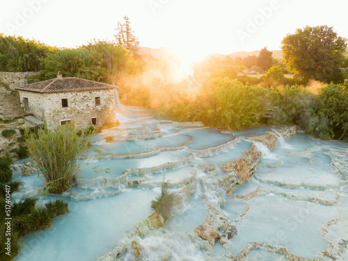 View from above, stunning aerial view of Le Cascate del Mulino, a group of beautiful hot springs in the municipality of Manciano, Tuscany.