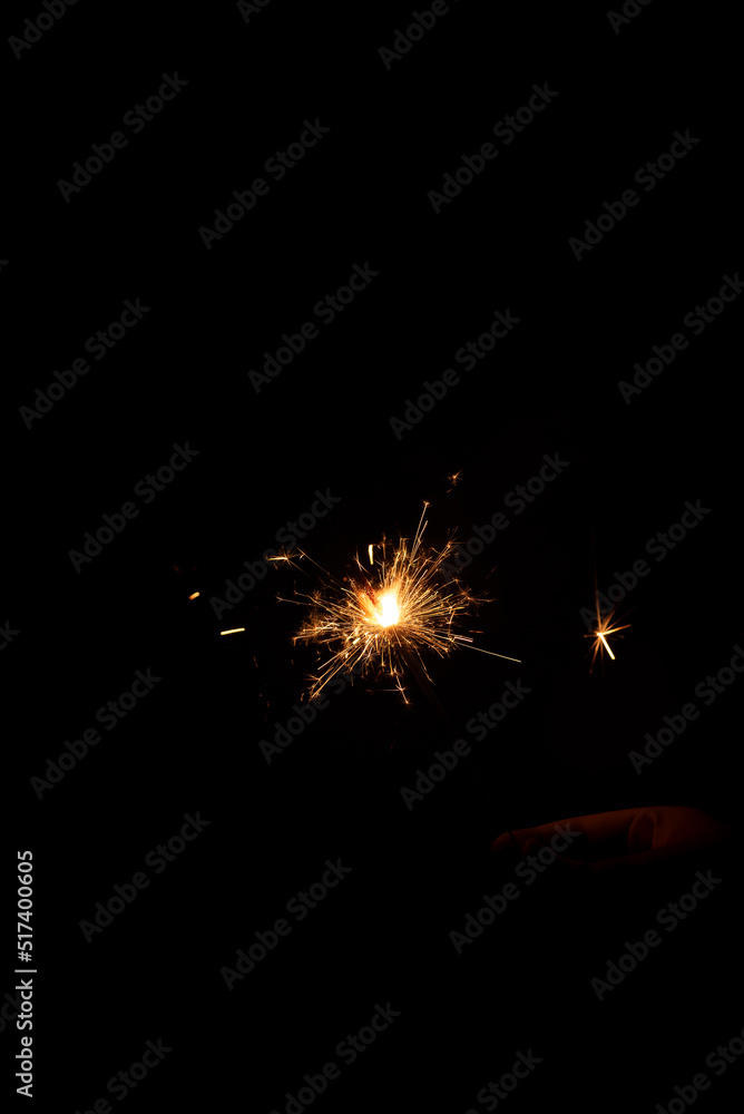 sparkler on black background sparkler on black background