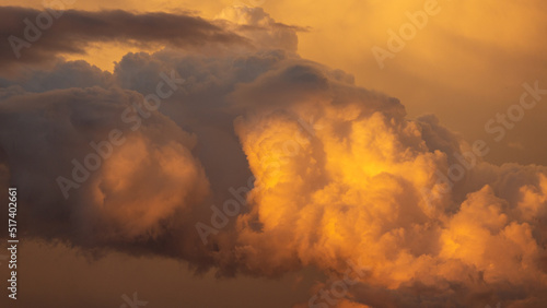Monsoon clouds above the Sonoran Desert in the heat of summer. Heaven like, with heavenly fluffy, billowing, colorful cloudscapes high in the sky. Tucson, Arizona, USA.