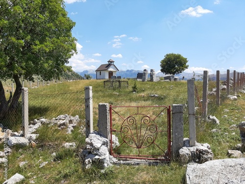 Old stone church with tombstones in Blace, mountain Bjelasnica, Bosnia and Herzegovina