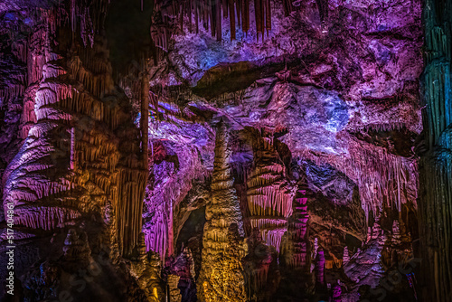 Very colorful stalactites, stalagmites, and columns in Paradise Cavern of Lewis and Clark Caverns State Park Montana.
