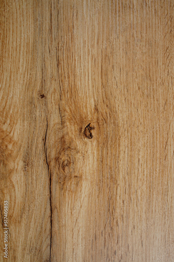Wooden background texture. Light brown surface of old knotty wood with a natural color Wooden background texture. Light brown surface of old knotty wood with a natural color