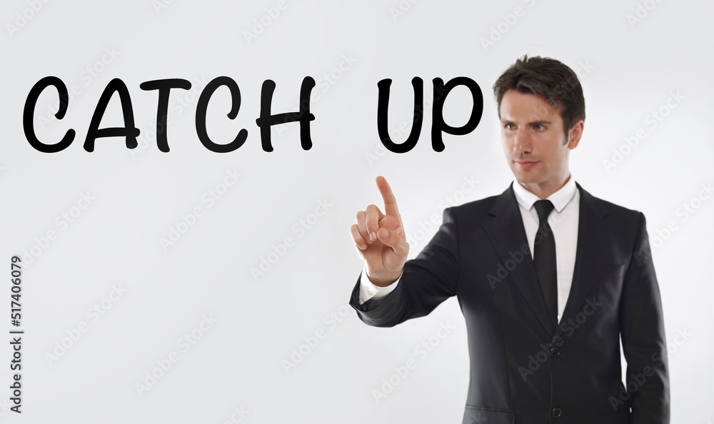 Man touching on a touchscreen with “Catch up” text Man touching on a touchscreen with “Catch up” text