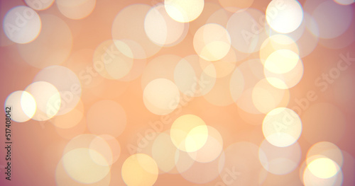 Abstract multicolored soft bokeh circles background. Christmas holiday concept orange, yellow colored glowing magic light bokehs. 