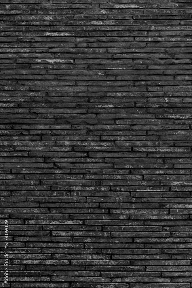 Black brick wall. Background of modern interior design.