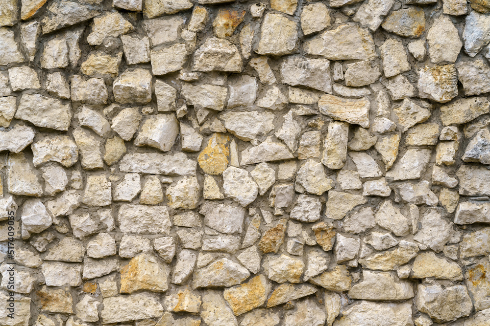 Wall of gray stones. Stone building background. Wall of gray stones. Stone building background.