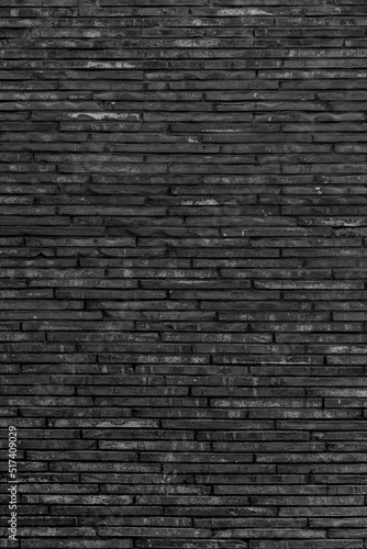 Black brick wall. Background of modern interior design.