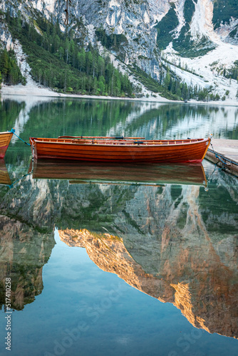 Wooden boat on mountain lak...