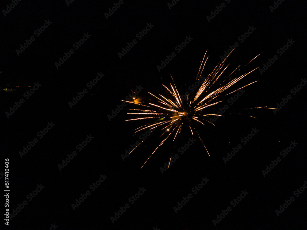 custom made wallpaper toronto digitalFireworks exploding in the sky on the 4th of July. Fireworks of different sizes and colors are observed by a drone flying above them or beside them.