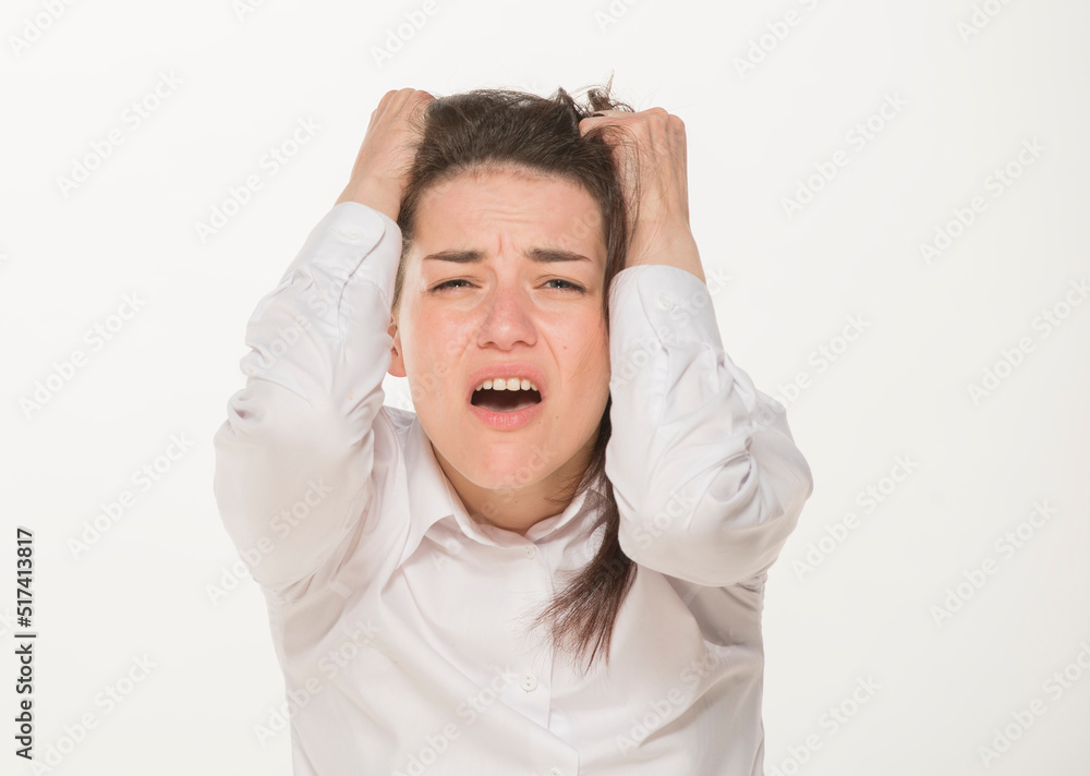 portrait of a girl in a white shirt isolated.close-up portrait of a young girl in a white shirt on a white background isolated.emotions joy happiness surprise calmness chagrin.win lose.